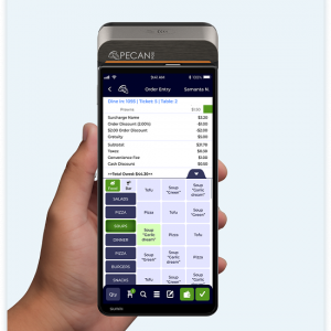 Hand holding a smartphone with a restaurant order-entry app showing menu buttons and a receipt total; card reader mounted on top of the phone.